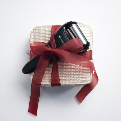 ultimate skinceuticals gift set wrapped in a red bow